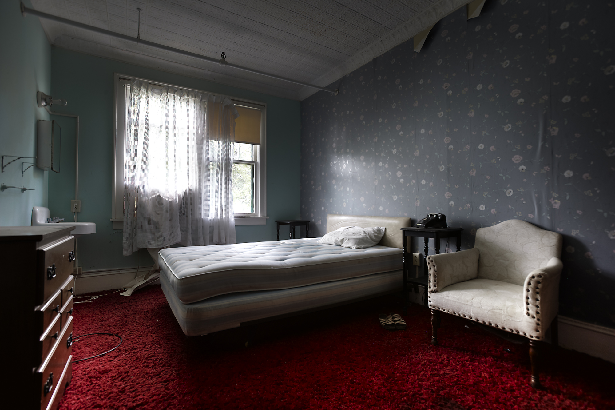 Single queen room at the Adler Hotel.