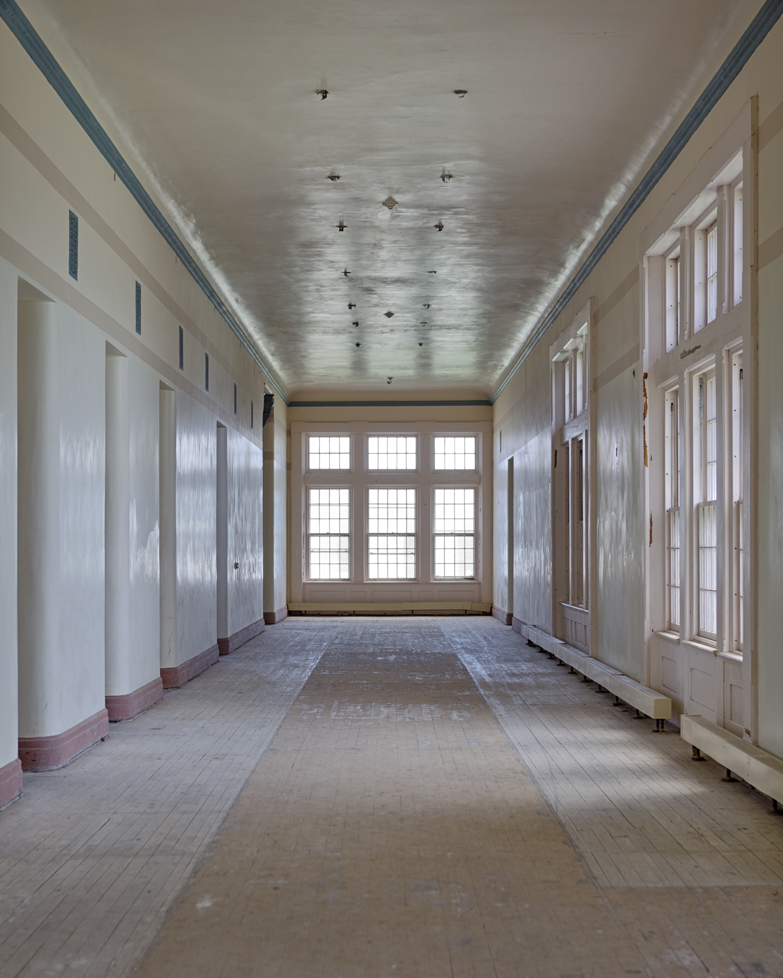 White hallway at Buffalo State Hospital in the process of rennovation.