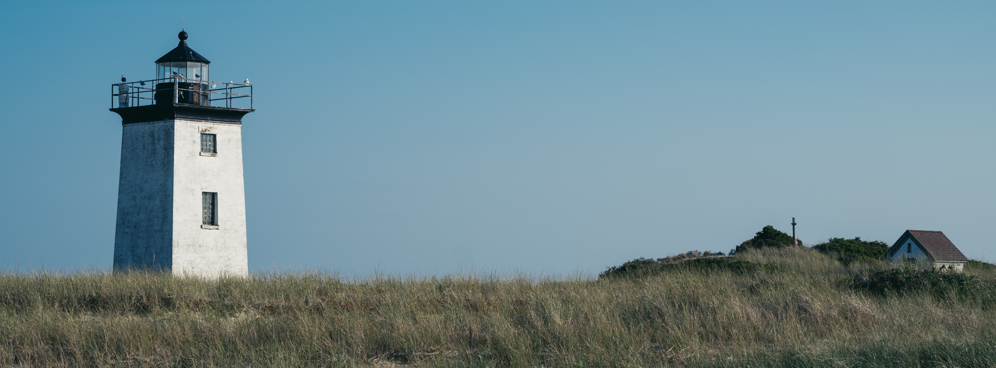 Image of Long Point Lighthouse in Provincetown, Massachusetts late in the day.