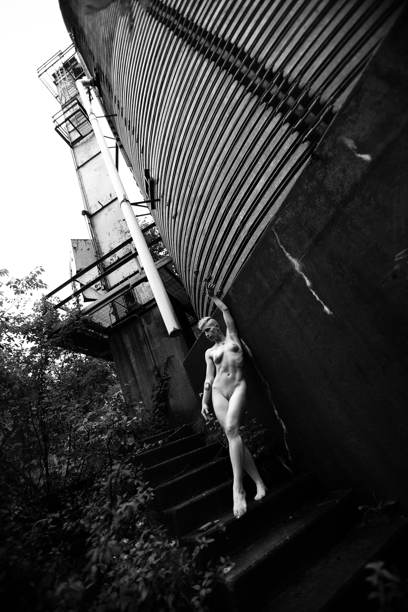 Photo of model Lauren on the stairs at Central Steam Power Plant.