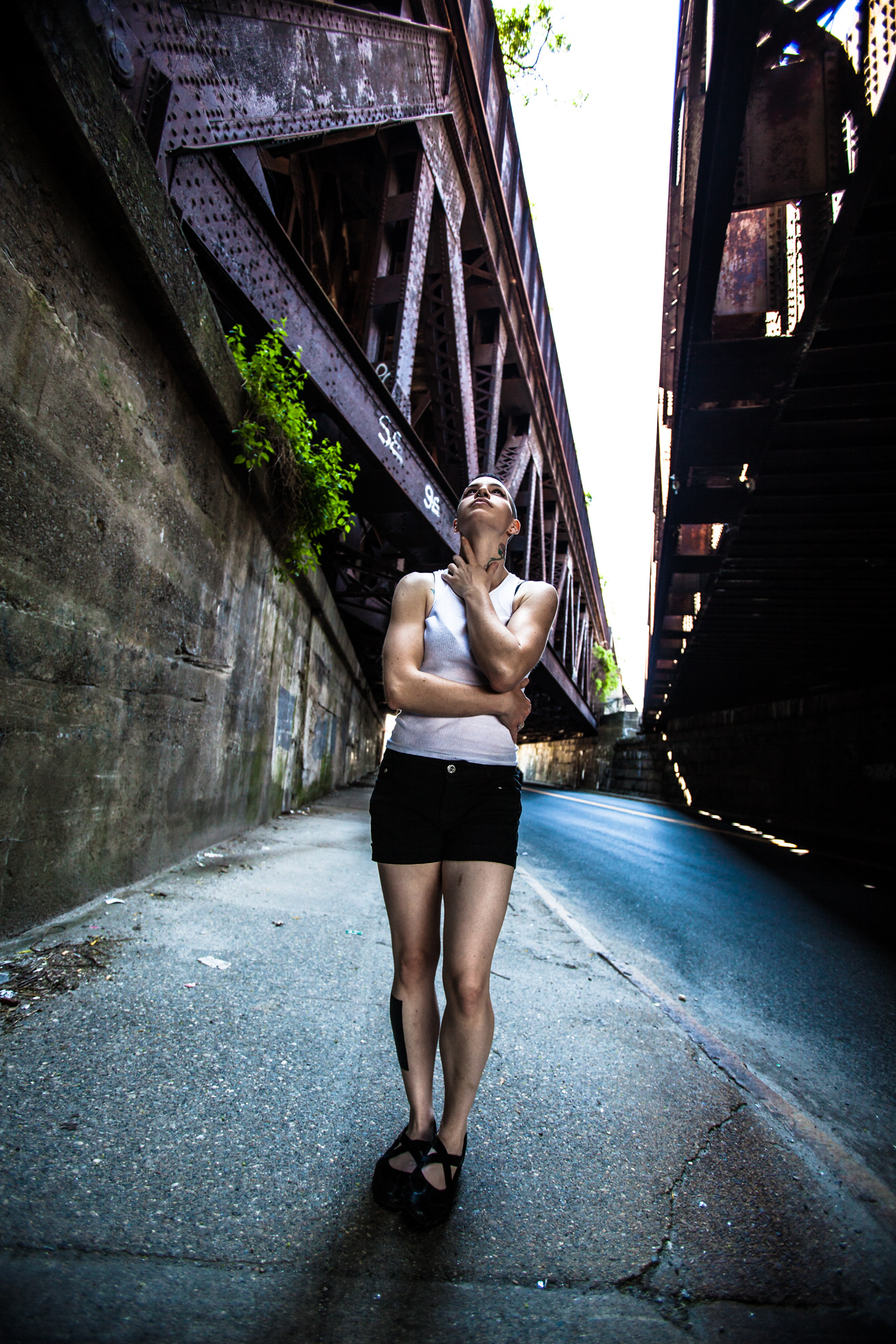 Model Lauren contemplating the magnificence of industrial engineering.