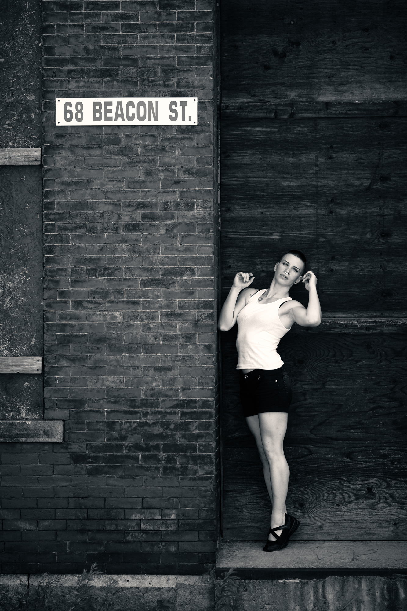 Model Lauren posing in front of 68 Beacon Street.