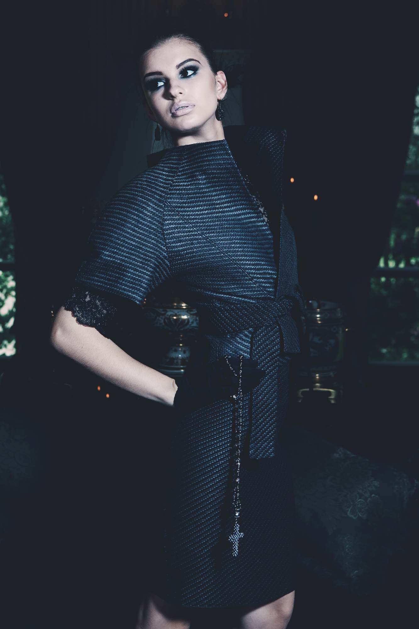 Model posing in an outfit from DH Studios 2013 collection.