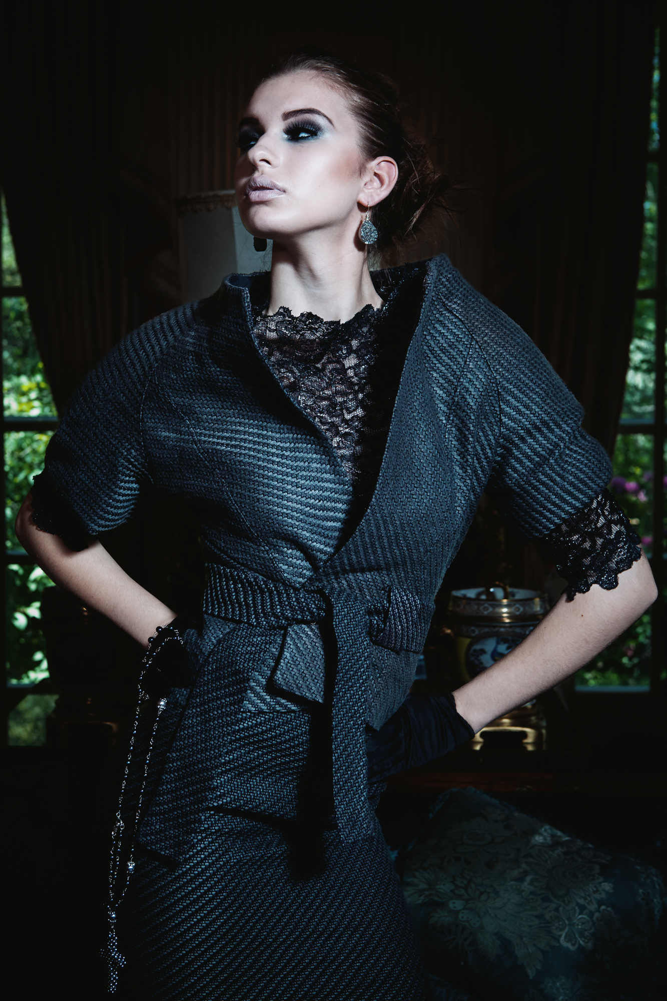 Model posing in an outfit from DH Studios 2013 collection.