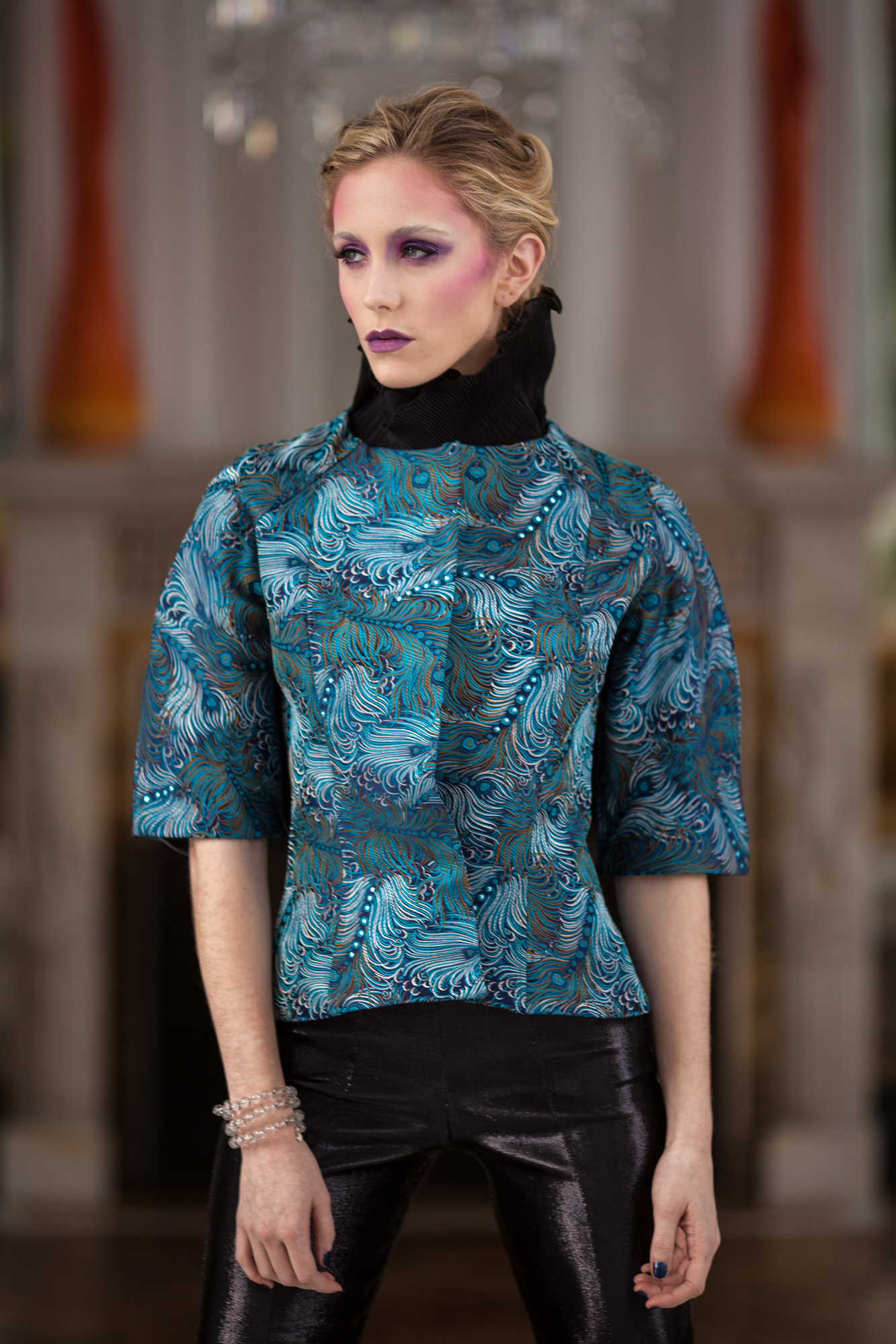 Model wearing an outfit from the DH Studios 2014 collection.