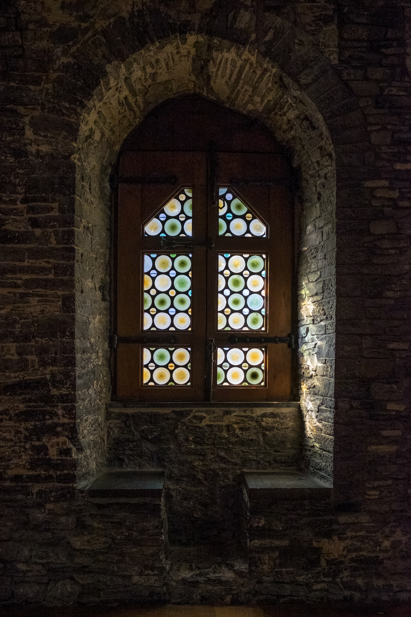 Window in the interior of Castle of the Counts in Ghent, Belgium