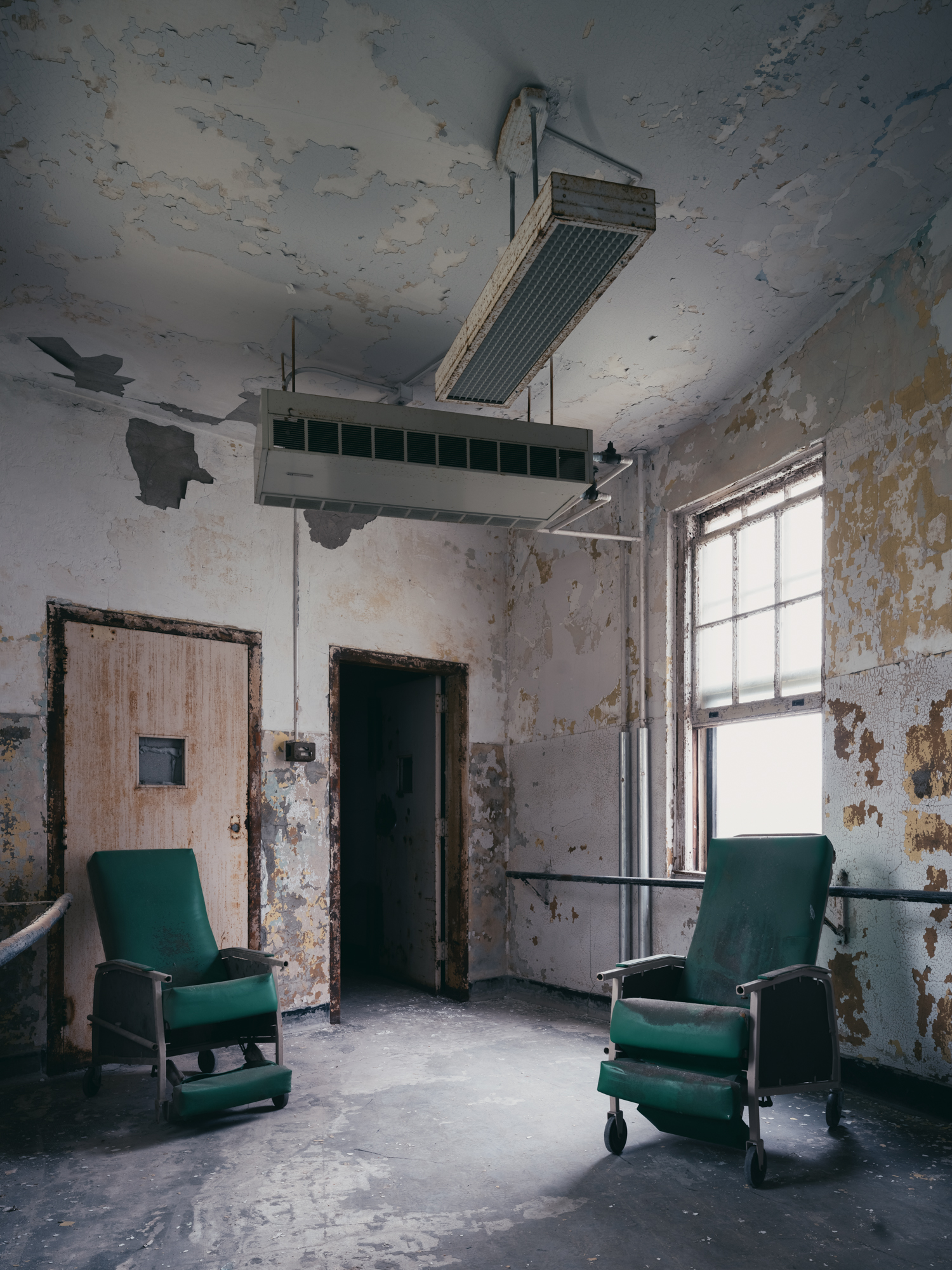 Chairs in connector between wings at Buffalo State Hospital