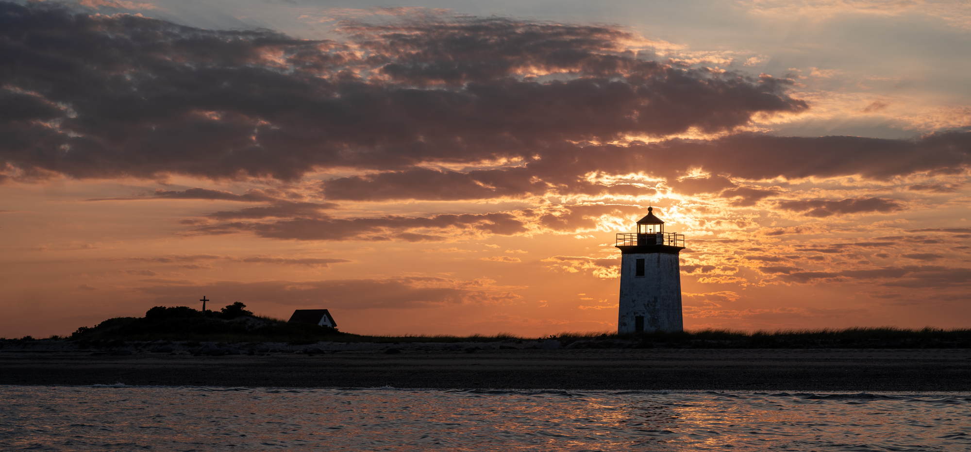 Long Point Lighthouse in Provincetown, Massachusetts at sunset.