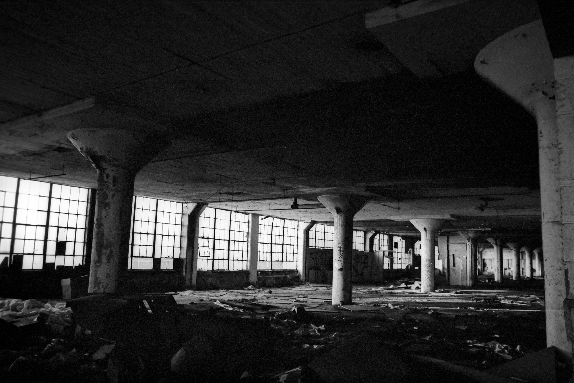 Factory floor and windows at the Packard Plant in Detroit, MI.