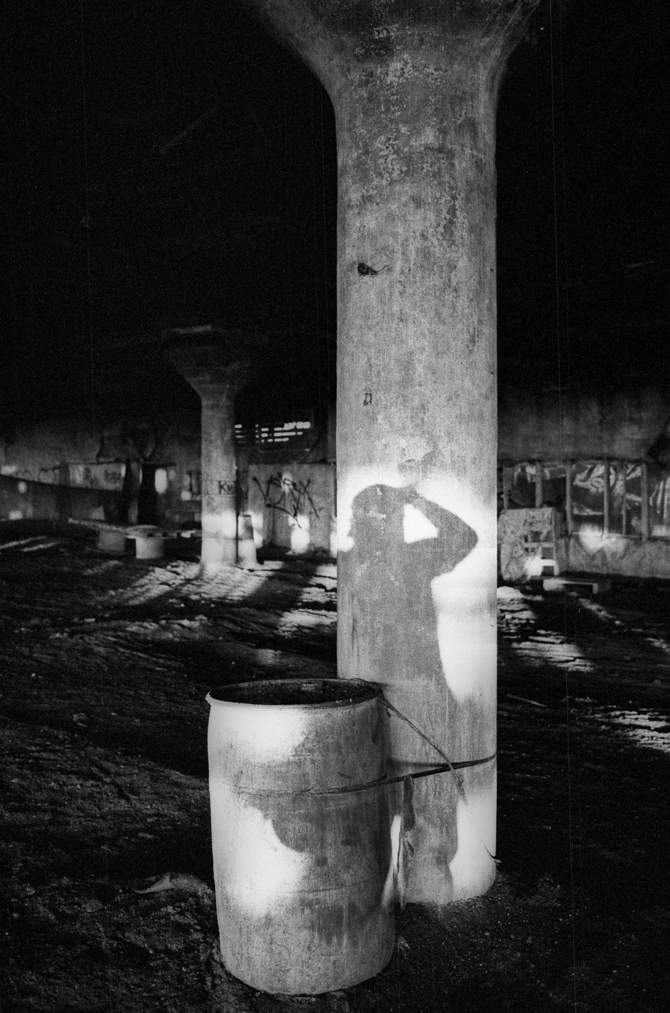 Photographer's shadow at the Packard Plant in Detroit, MI.